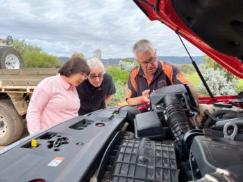 Checking the air filter as part of the under bonnet inspections.